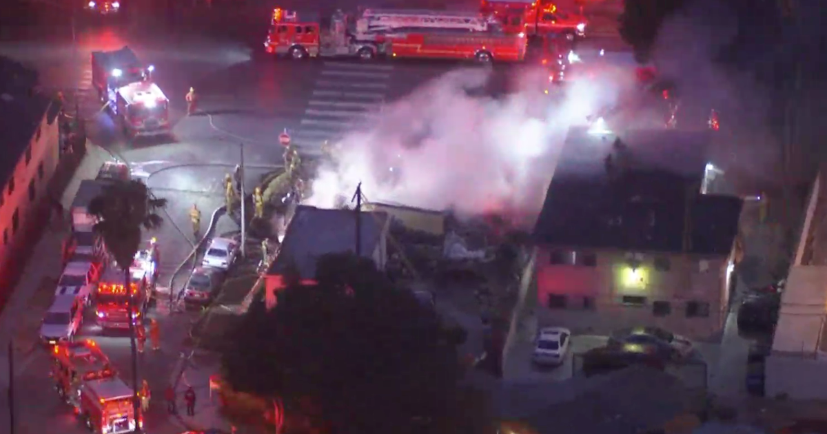 Several vehicles damaged in South LA carport fire - CBS Los Angeles