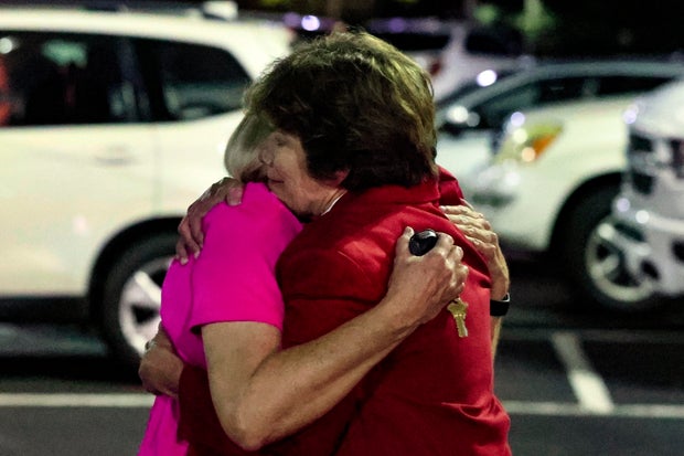 Church members console each other after a shooting at the St. Stephen's Episcopal Church on Thursday, June 16, 2022, in Vestavia Hills, Ala. 