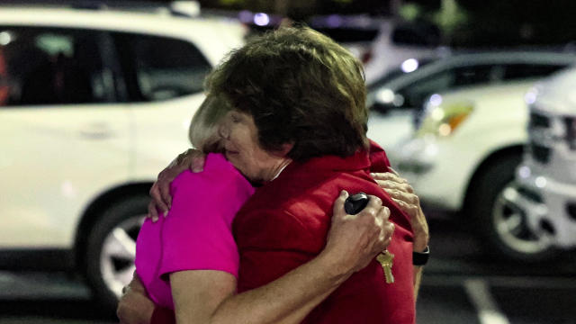 Church members console each other after a shooting at the St. Stephen's Episcopal Church on Thursday, June 16, 2022, in Vestavia Hills, Ala. 