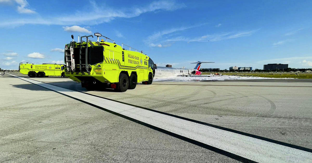 Airplane catches fire at Miami airport after landing gear “collapsed;” 3 taken to the hospital officials say – CBS News