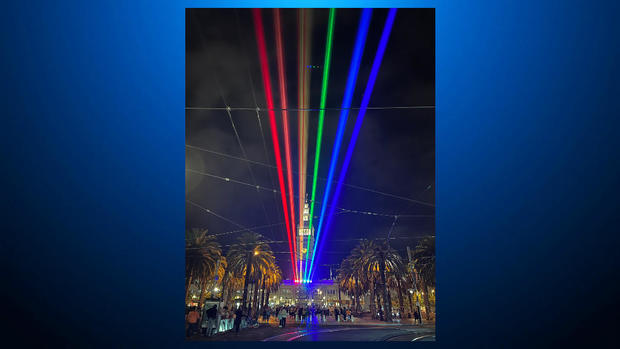 SF Pride rainbow laser display on Market Street 