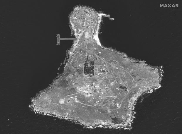 A satellite image shows an overview of Snake Island 