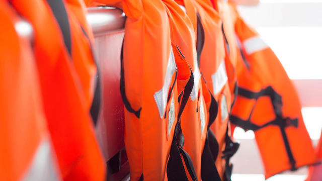 Close-Up Of Life Jackets On Boat 