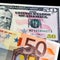 Euro drops to 20-year low, falling below a dollar