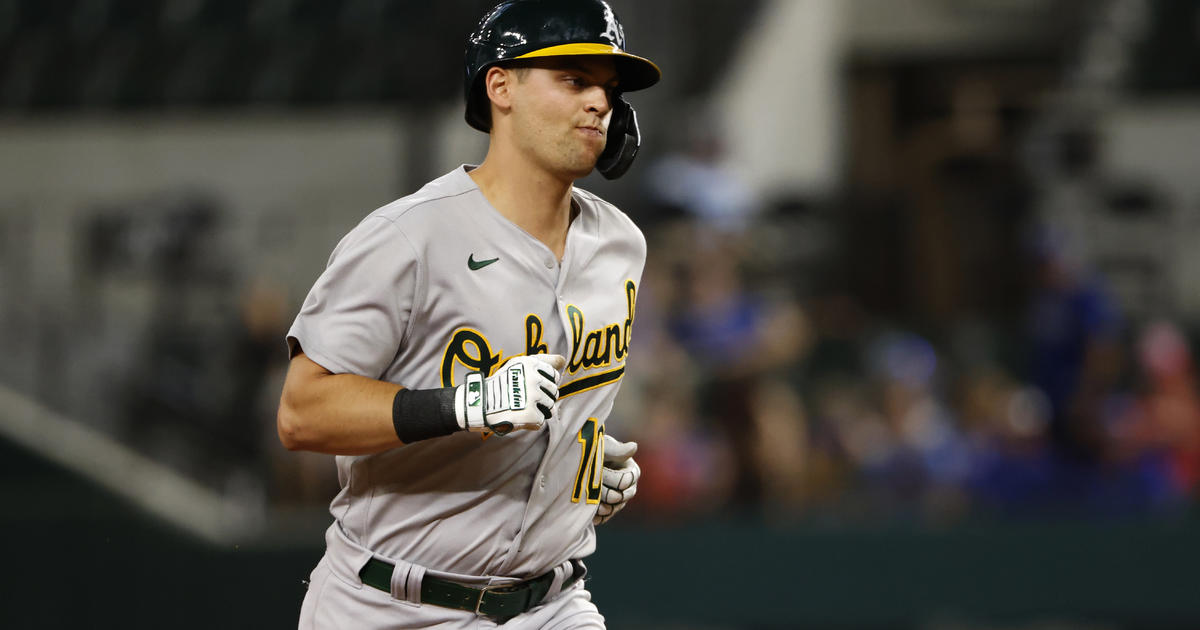 Pinder's 12th-inning slam lifts A's over Rangers 14-7