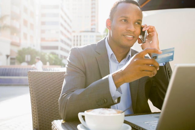 Businessman using a business credit card 