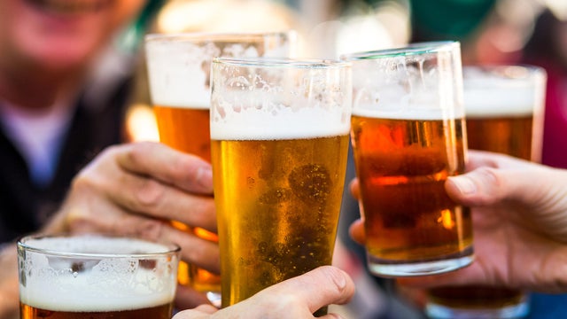 Cheers Celebration Toast with Pints of Beer