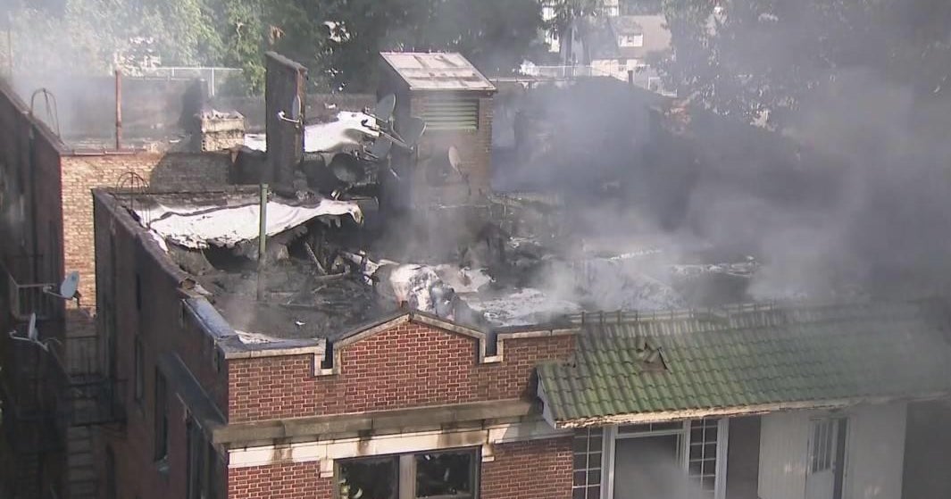 1 dead, 5 firefighters hurt, 18 families displaced by overnight fire at