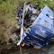 Bus falls off bridge onto riverbank in Kenya, killing at least 30