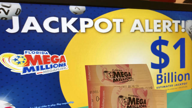 Mega Millions lottery tickets are seen at a lottery retailer in Surfside, Fla., July 27, 2022. 