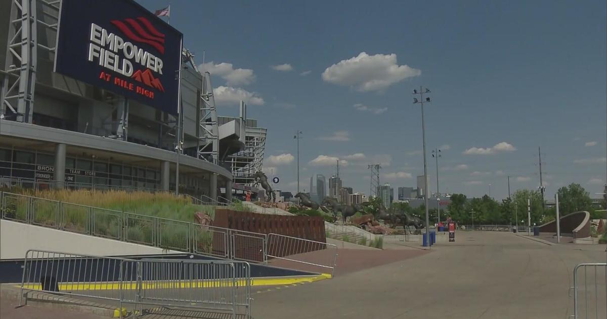 Woman dies at Kenny Chesney concert at Mile High