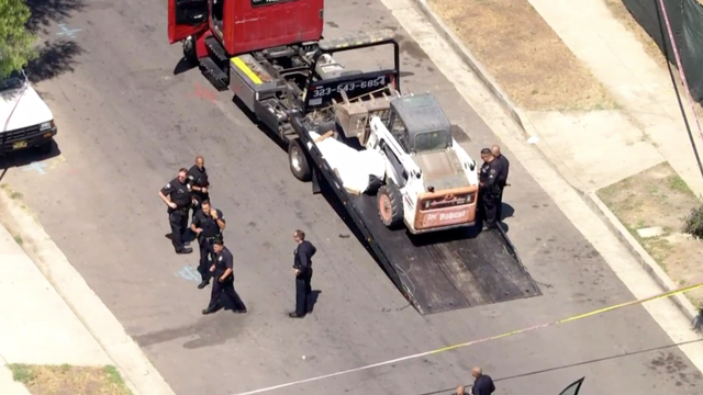 worker driver Skid steer remove Worn Asphalt 