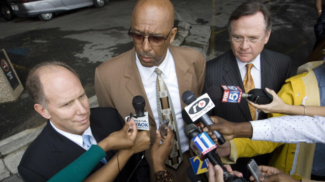 Attorney Dwight Thomas speaks to reporters in a file photo from 2007 