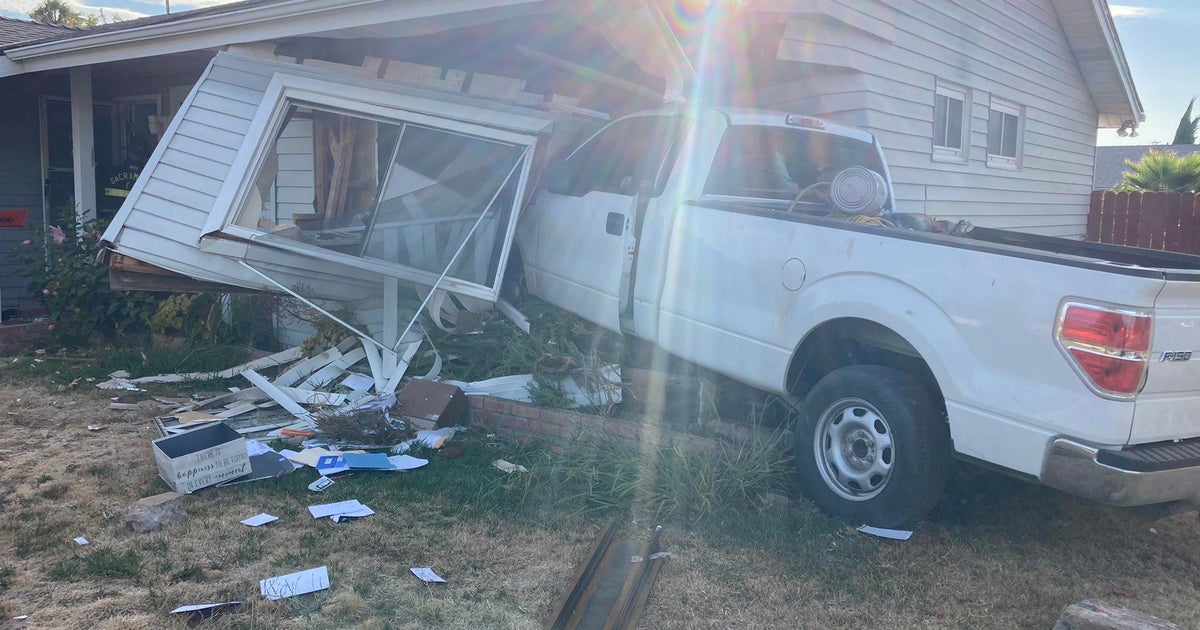 Man hurt after driver fleeing police crashes into Sacramento home