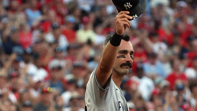 Matt Carpenter #24 of the New York Yankees acknowledges the crowd in his first game against the St. Louis Cardinals as a New York Yankee in the first inning at Busch Stadium on August 5, 2022 in St Louis, Missouri. 