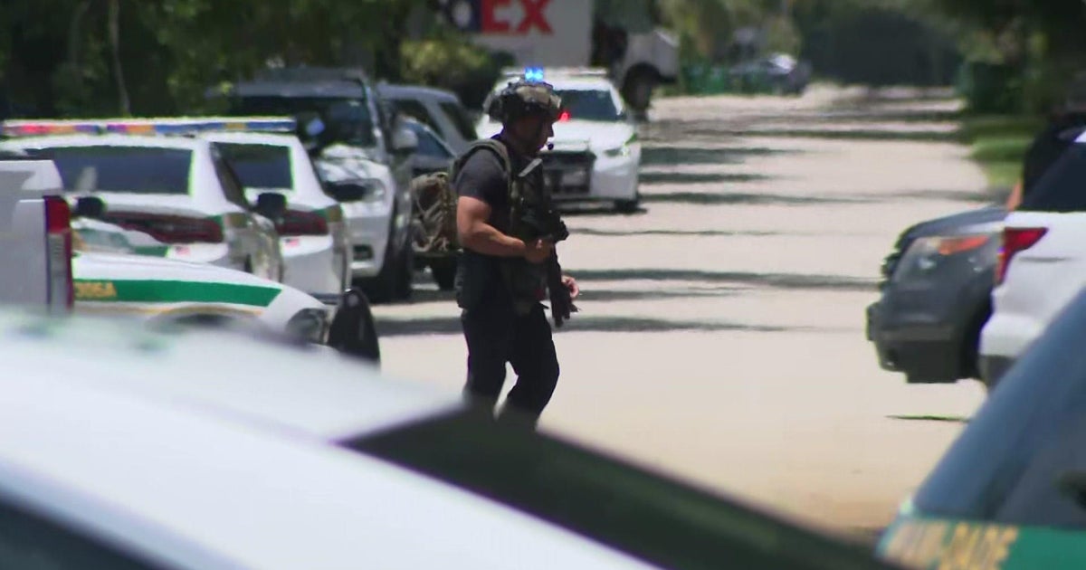 Miami-Dade police in standoff with barricaded armed man
