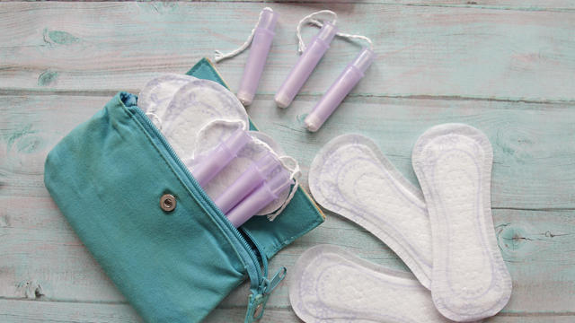 Menstrual bag with cotton tampons and sanitary pads 