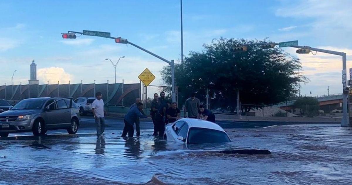 Woman in El Paso rescued from car moments before it's swallowed up by sinkhole