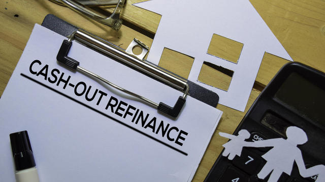 Cash-Out Refinance text on Document form isolated on office desk. 