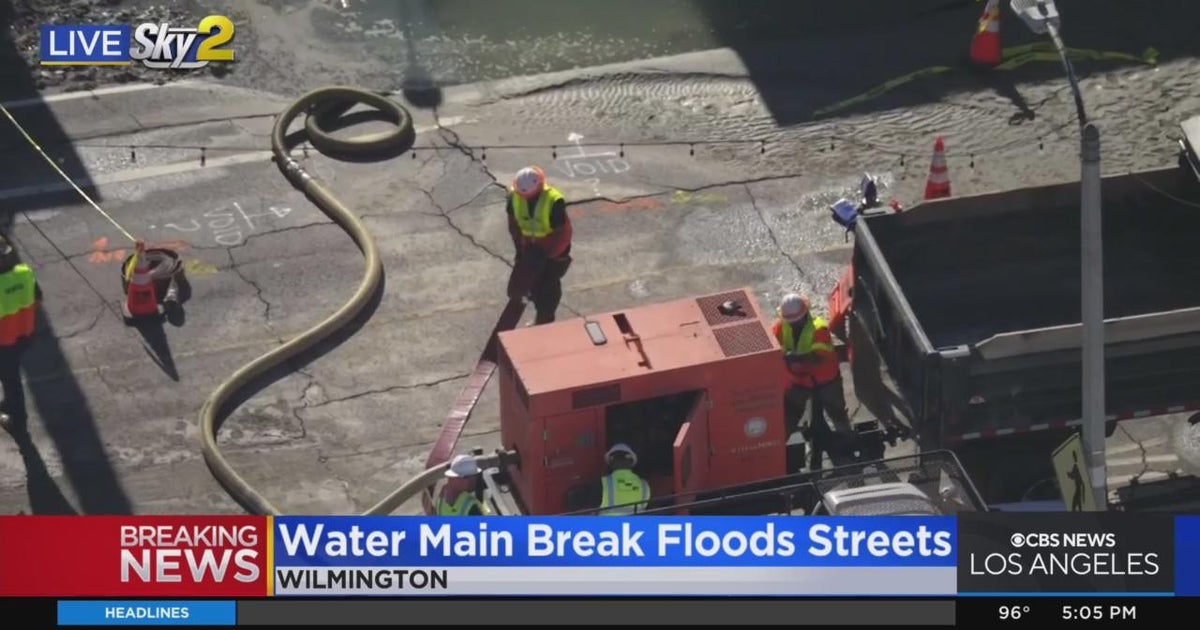 Water main break causes flooding, damages street in Wilmington - CBS ...
