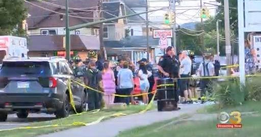 At least 13 people injured after car plows into crowd at benefit for