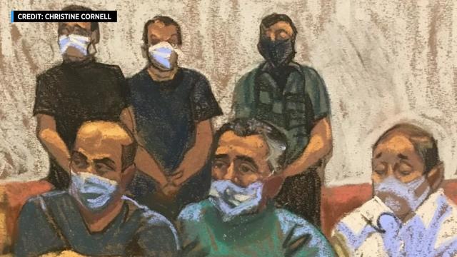 A court room sketch of six alleged mob members. 