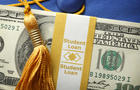 Student Loan Money On A Graduation Cap 