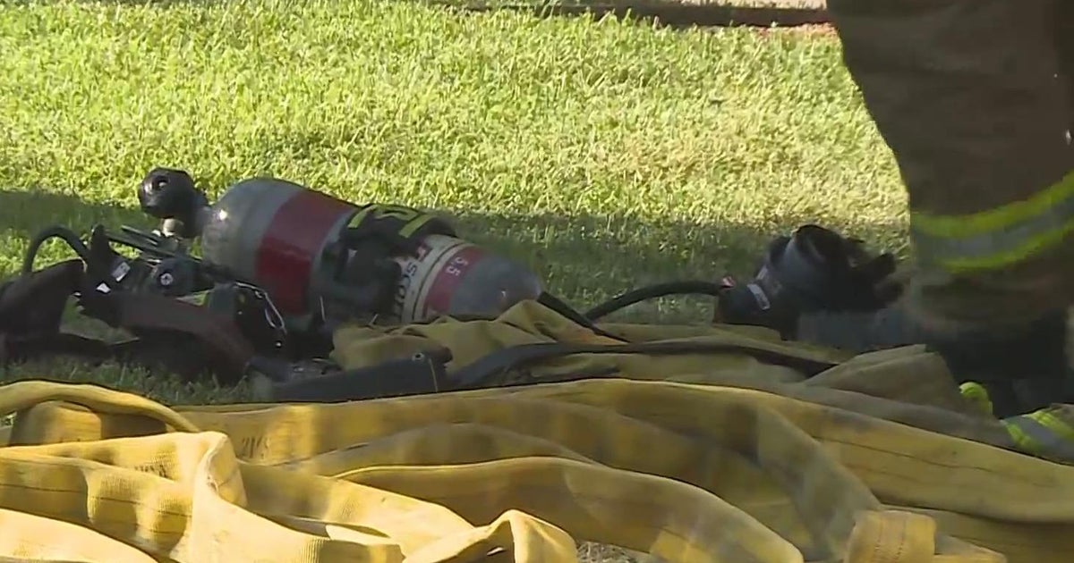 Sacramento Metro Fire is battling a housefire involving powerlines