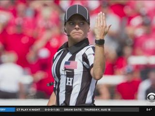 NFL Down Judge Robin DeLorenzo stands on the field during an NFL