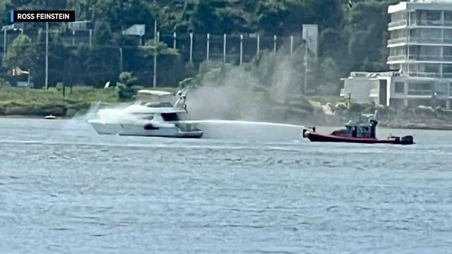 Crews battle a boat fire on the Hudson River. 