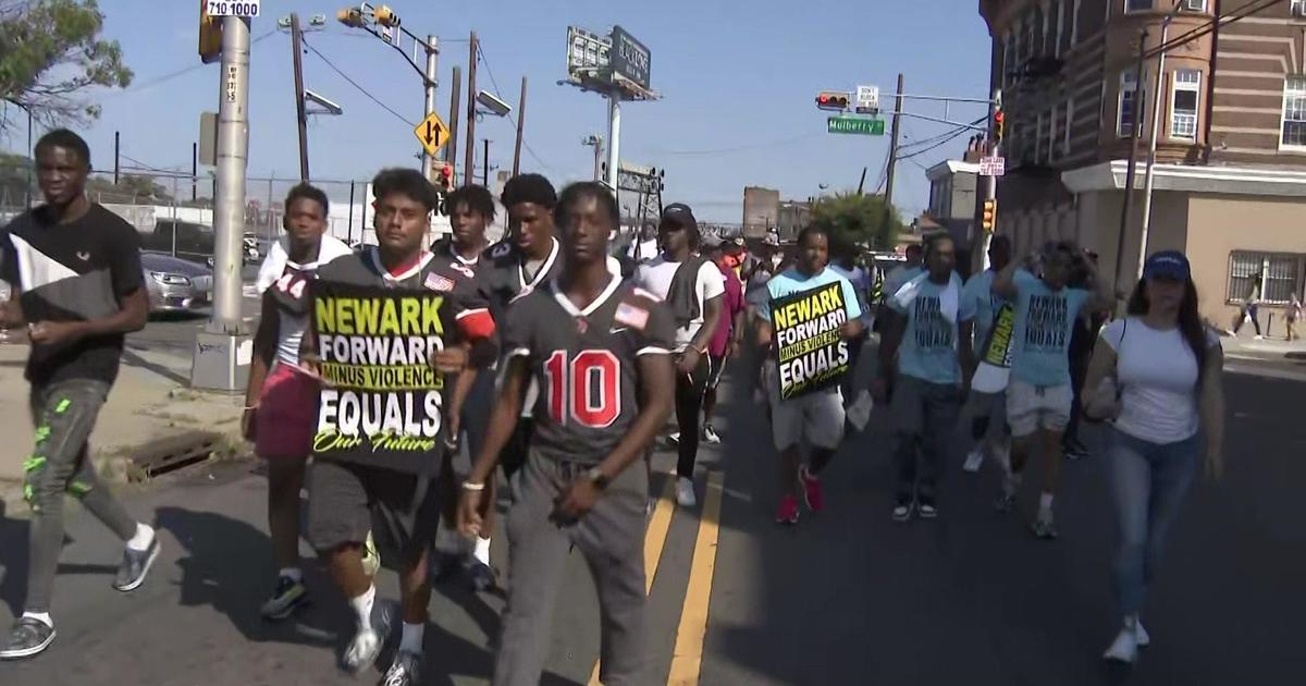 Newark residents take to the street for 13mile peace walk CBS New York