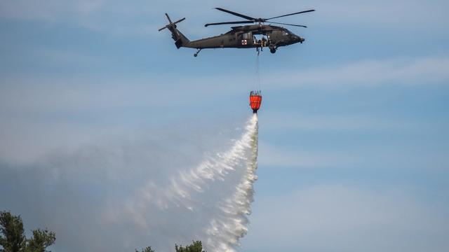 national-guard-helicopter-water-for-brush-fire-credit-russ-chasse-2.jpg 