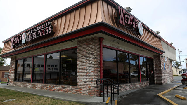 The Wendy's logo is seen above the restaurant near 