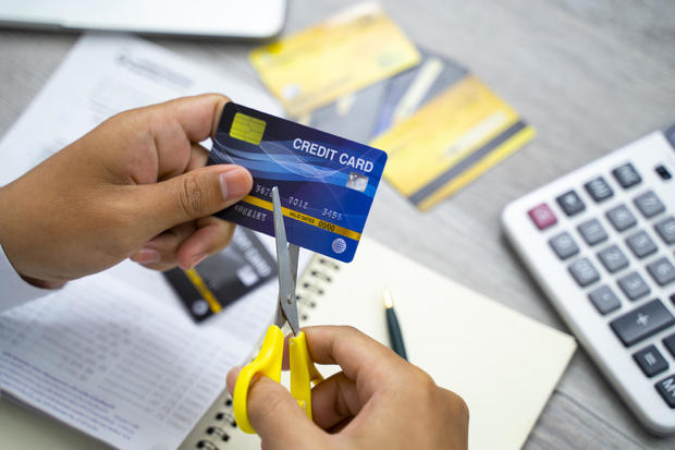 Scissors cutting a credit card 