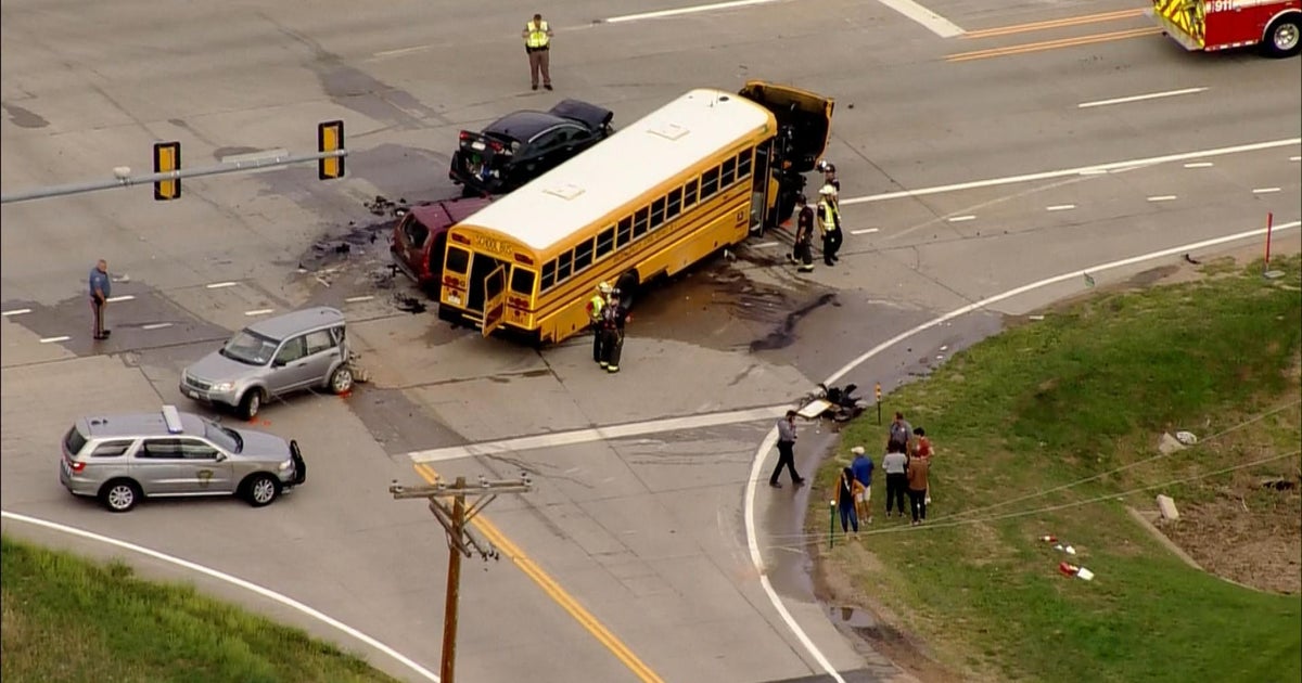4 hurt when school bus collides with 2 cars - CBS Colorado