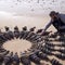 Artist Jon Foreman, whose canvas is a beach