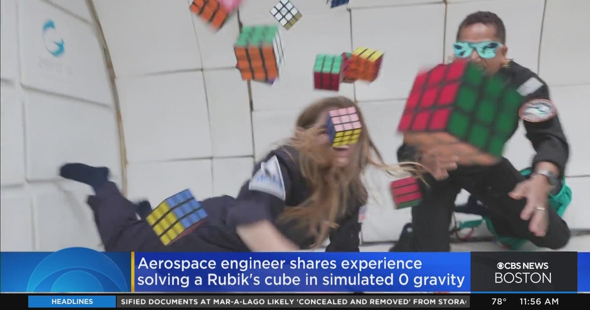 Aerospace engineer solves Rubik's cube in simulated zero gravity