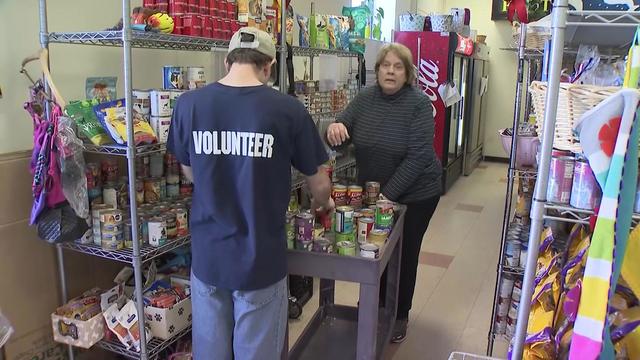 Volunteers work at a Long Island food bank. 