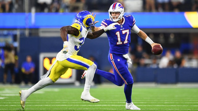 Josh Allen stiff-arms Nick Scott 