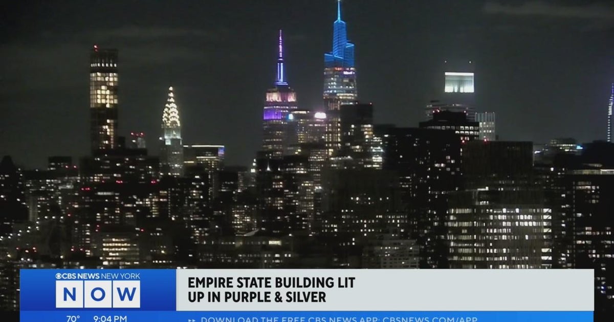 Empire State Building lit up in purple and silver for Queen Elizabeth