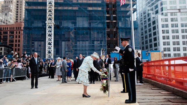 Britain's Queen Elizabeth stands back after dedicating a wreath of flowers at the site of the September 11, 2001 World Trade Center attack during her visit to New York July 6, 2010. 