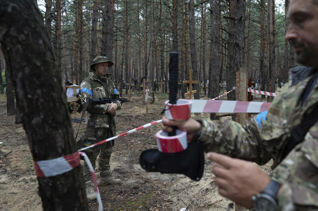 Mass grave found in recaptured city in Ukraine, Zelenskyy says