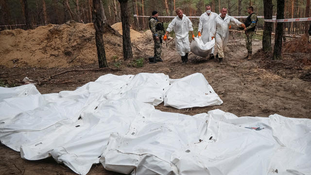 Entire family, including a young child, among hundreds of victims found in newly-discovered mass grave in Ukraine