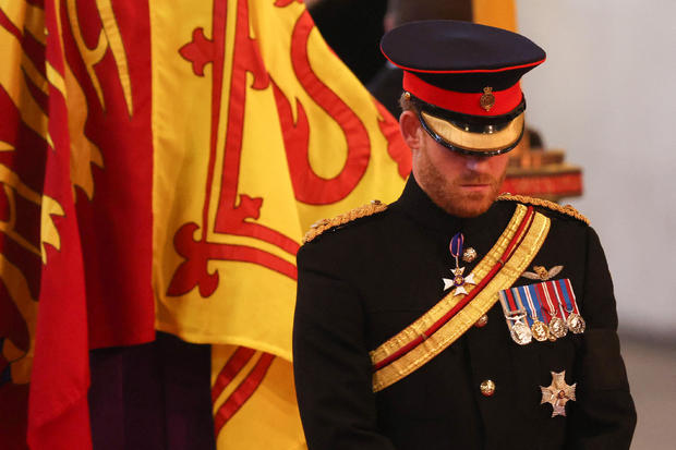 Prince Harry, Duke of Sussex, mounts a vigil around the coffin of Queen Elizabeth II at the Palace of Westminster in London