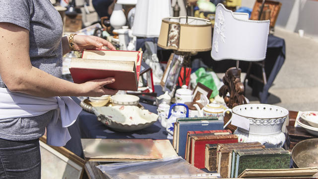 Woman making purchases at the flea market 