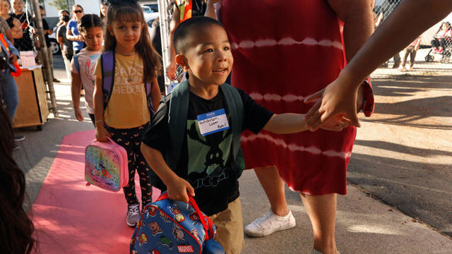 Students from the Los Angeles Unified School District head to school at Vena Avenue Elementary & Gifted/High Ability Magnet  on Aug. 15, 2022. 