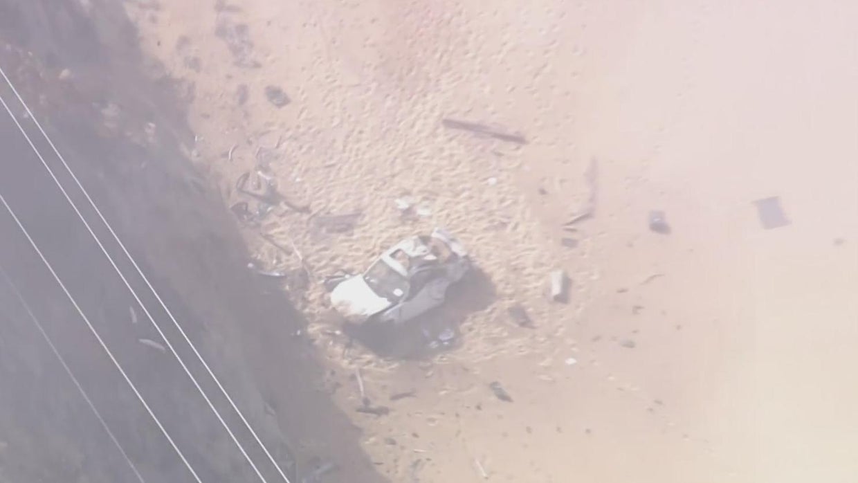 Update: Driver rescued after vehicle plunges 500 feet off cliff along ...