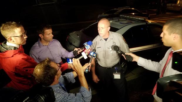 Fairfax police spokeman with reporters 