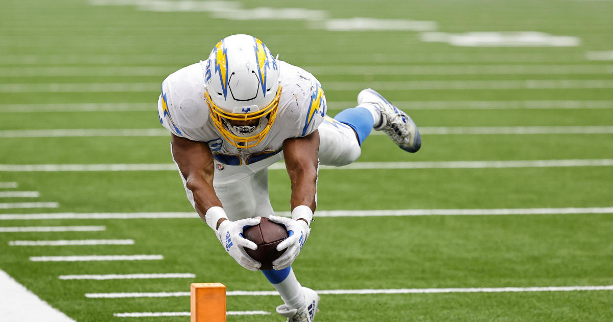 October 2, 2022: Los Angeles Chargers running back Austin Ekeler (30) runs  for a touchdown after making a catch during the 4th quarter of an NFL  football game between the Los Angeles