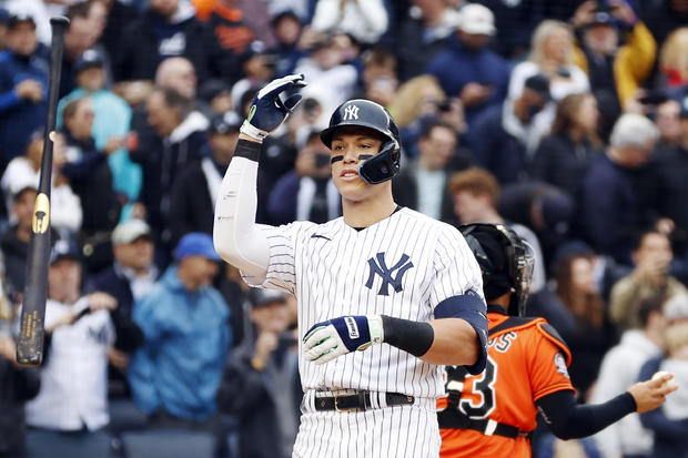 Aaron Judge #99 of the New York Yankees throws his bat after striking out during the fourth inning against the Baltimore Orioles at Yankee Stadium on October 01, 2022 in the Bronx borough of New York City. 